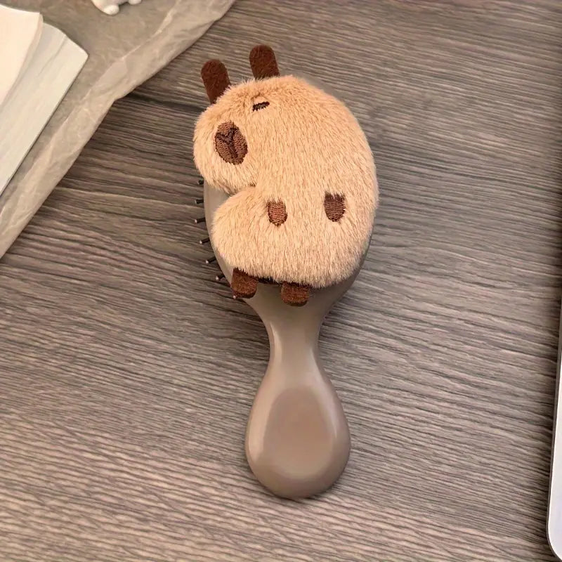 Estuche Capibara + cepillo