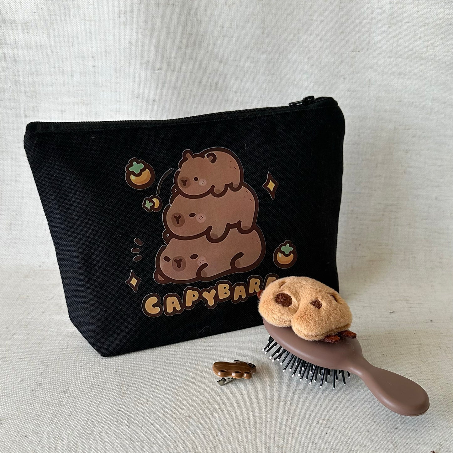 Estuche Capibara + cepillo