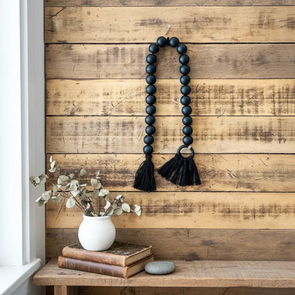 Adorno cuentas madera negras con borlas Adorno Frank Home Chile